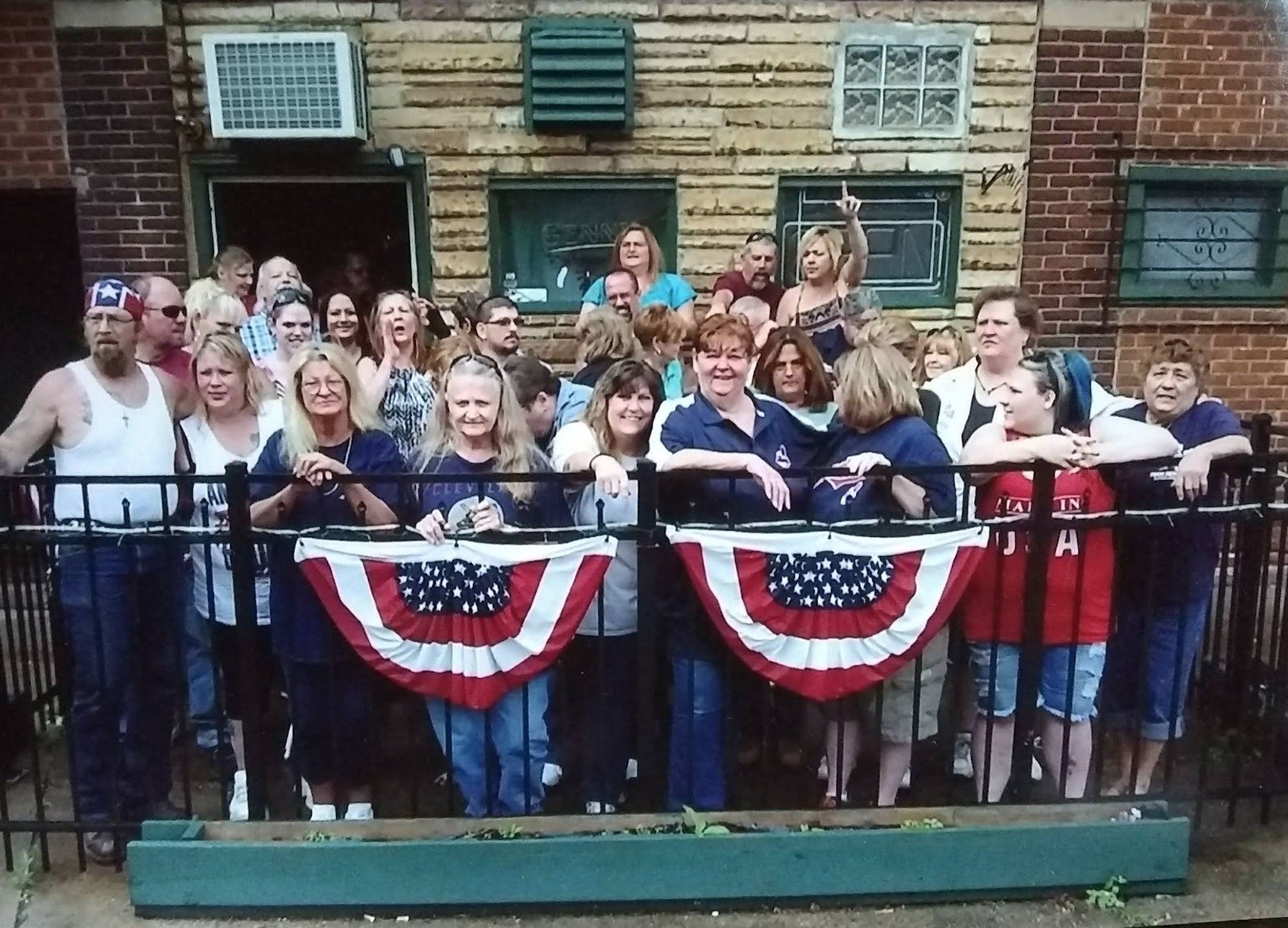 Group photo on outside patio at The Ugly Broad.